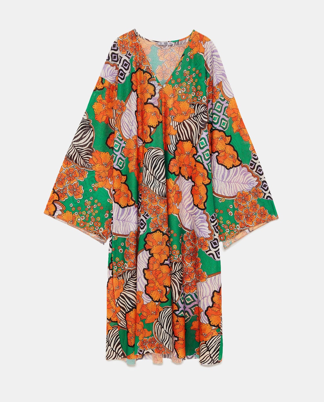 Vestido estampado retro de Zara Woman de nueva colección. Ideal para esta primavera y para regalar el Día de la Madre. (25,95 euros). Ficha  este otro vestido de Zara  de nueva colección por menos de 50 euros.