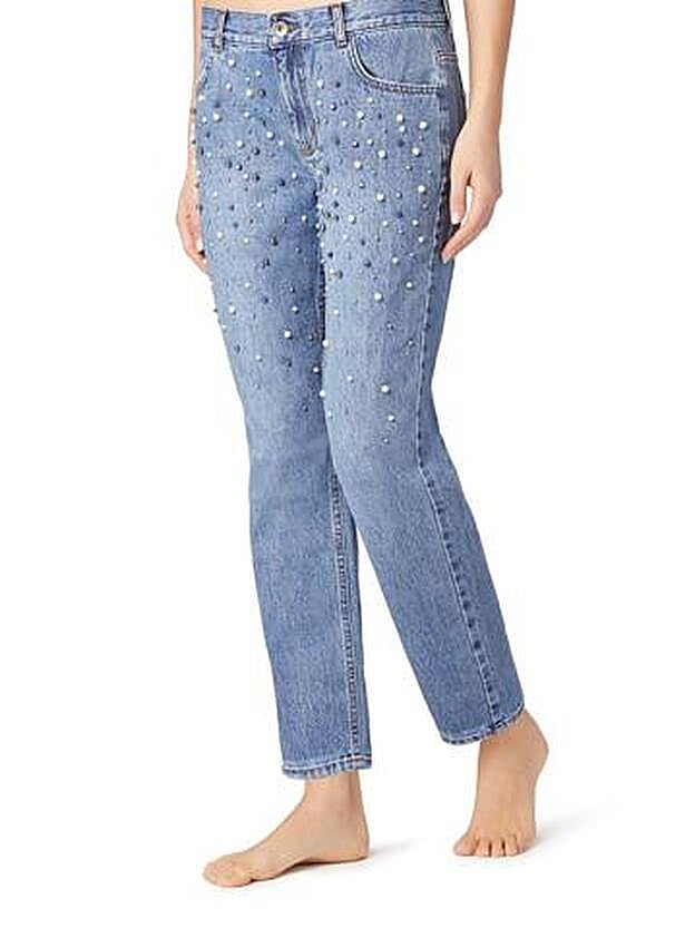 Pantalones de Calzedonia con aplicaciones de perlas, 22,90 euros.