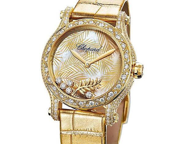 Reloj Happy Palm de oro amarillo (con la palma del festival de Cannes y cinco diamantes).