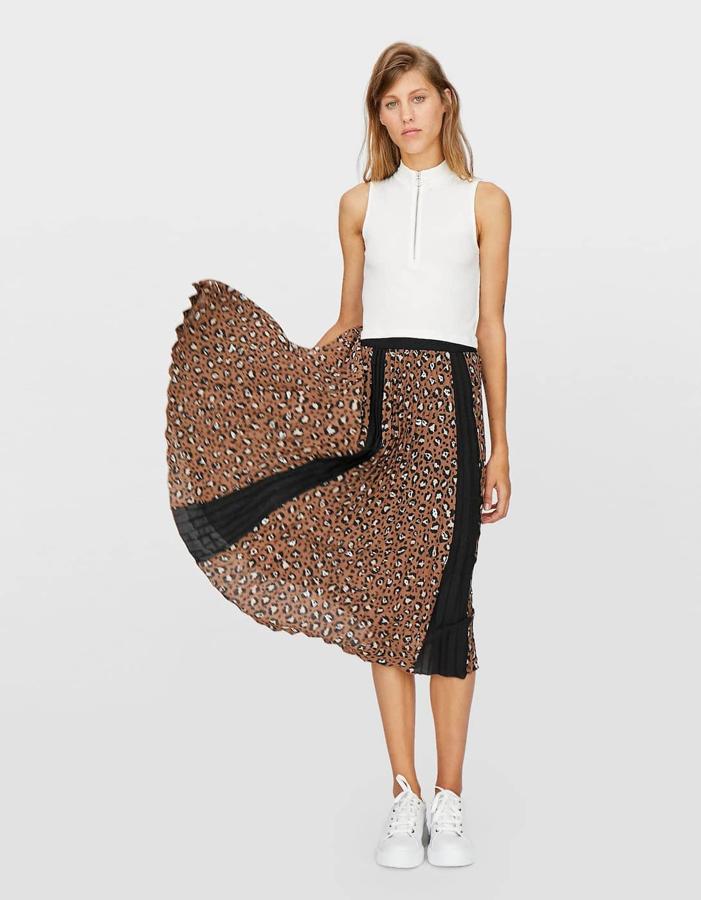 Falda plisada con cintura elástica, 19,99 euros.