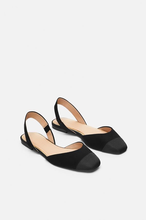 Estas bailarinas 'sling bang' en negro son perfectas para ir cómoda y derrochar estilo. Su precio: 12.99 euros.