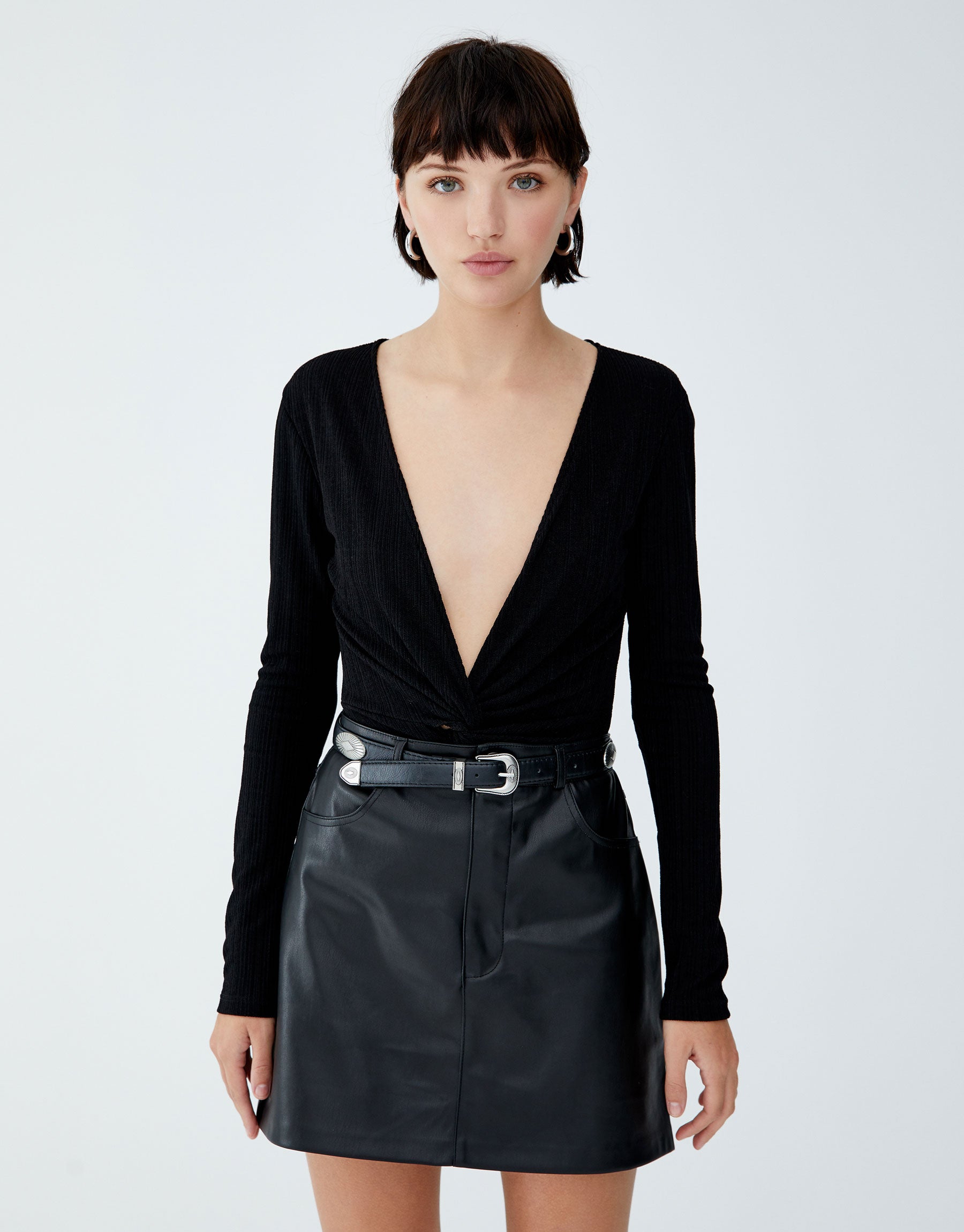 Body de manga larga con nudo y escote pronunciado: 15,99 euros en Pull & Bear.