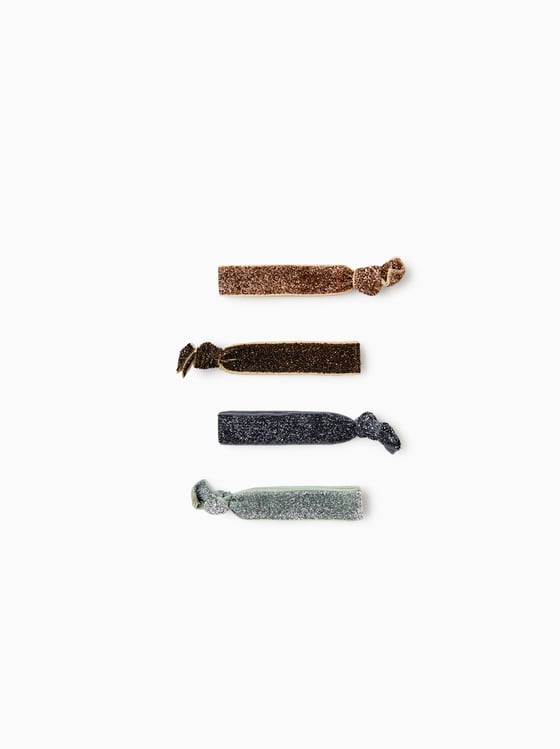 Coleteros en colores plateado, dorado, caldero y rosa con brillos: 3,95€ en Zara Kids