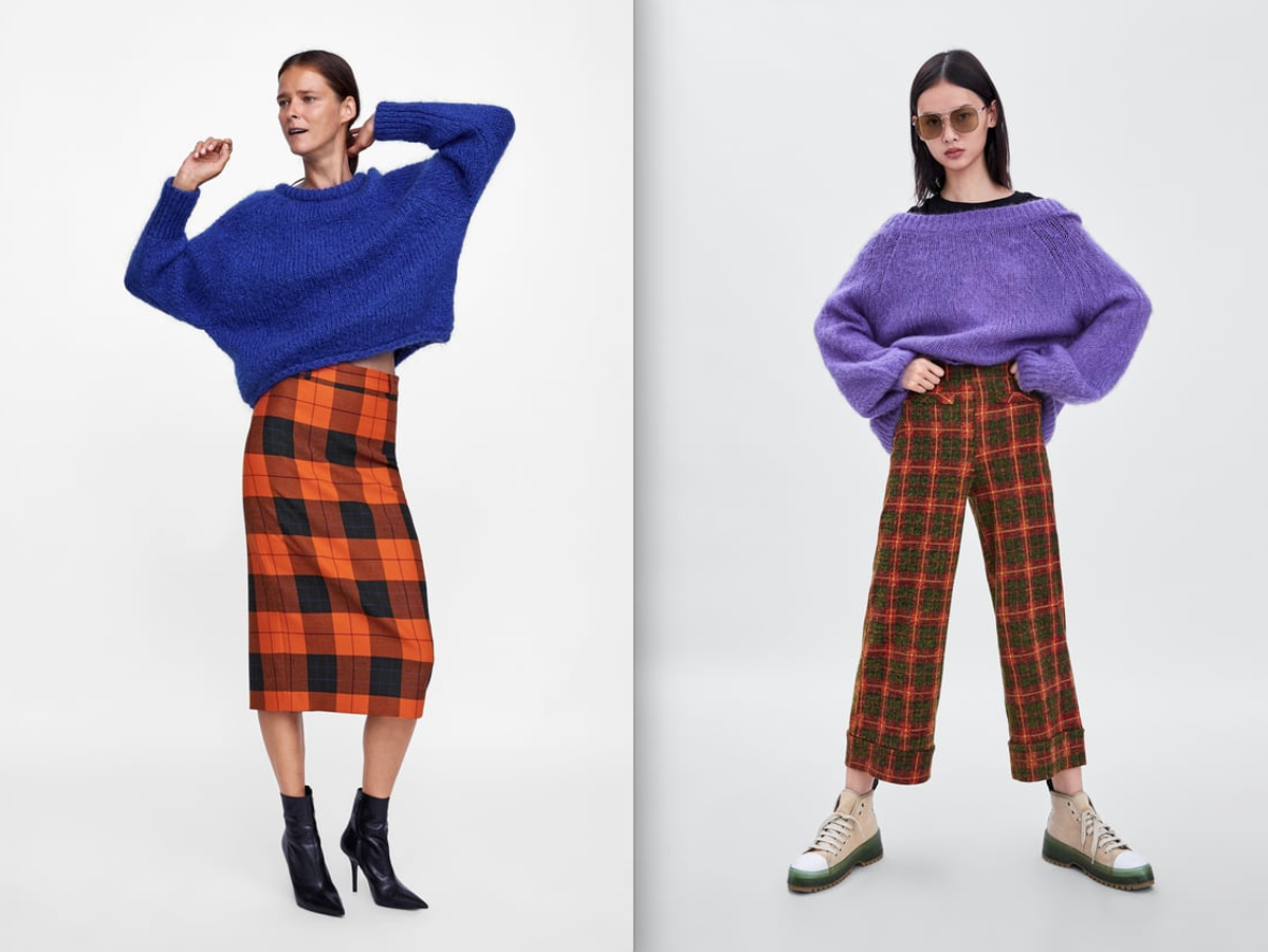 Nuestra tienda de cabecera en lo que a detección de tendencias se refiere ensayó a principios de temporada el contraste con el naranja, aunque no exactamente con el morado que nosotras ahora buscamos. La falda midi de cuadros escoceses (39,95 euros) se lleva fenomenal con el jersey azulón (25,95 euros) y los pantalones anaranjados (19,95 euros) se benefician del tono lila claro del jersey oversize (39,95 euros).