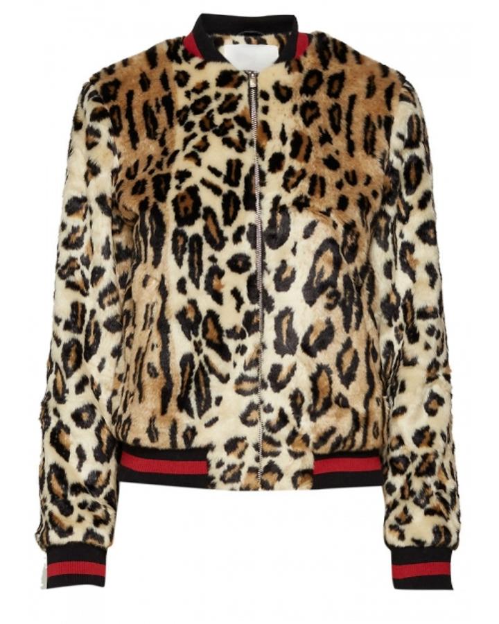 Fantástico diseño en pelo sintético, con un ribete en blanco y negro súper original (63,99 euros).