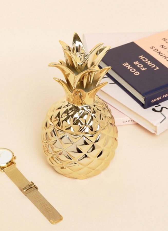 Una caja para joyas con diseño de piña de Sass & Belle (12,49 euros).