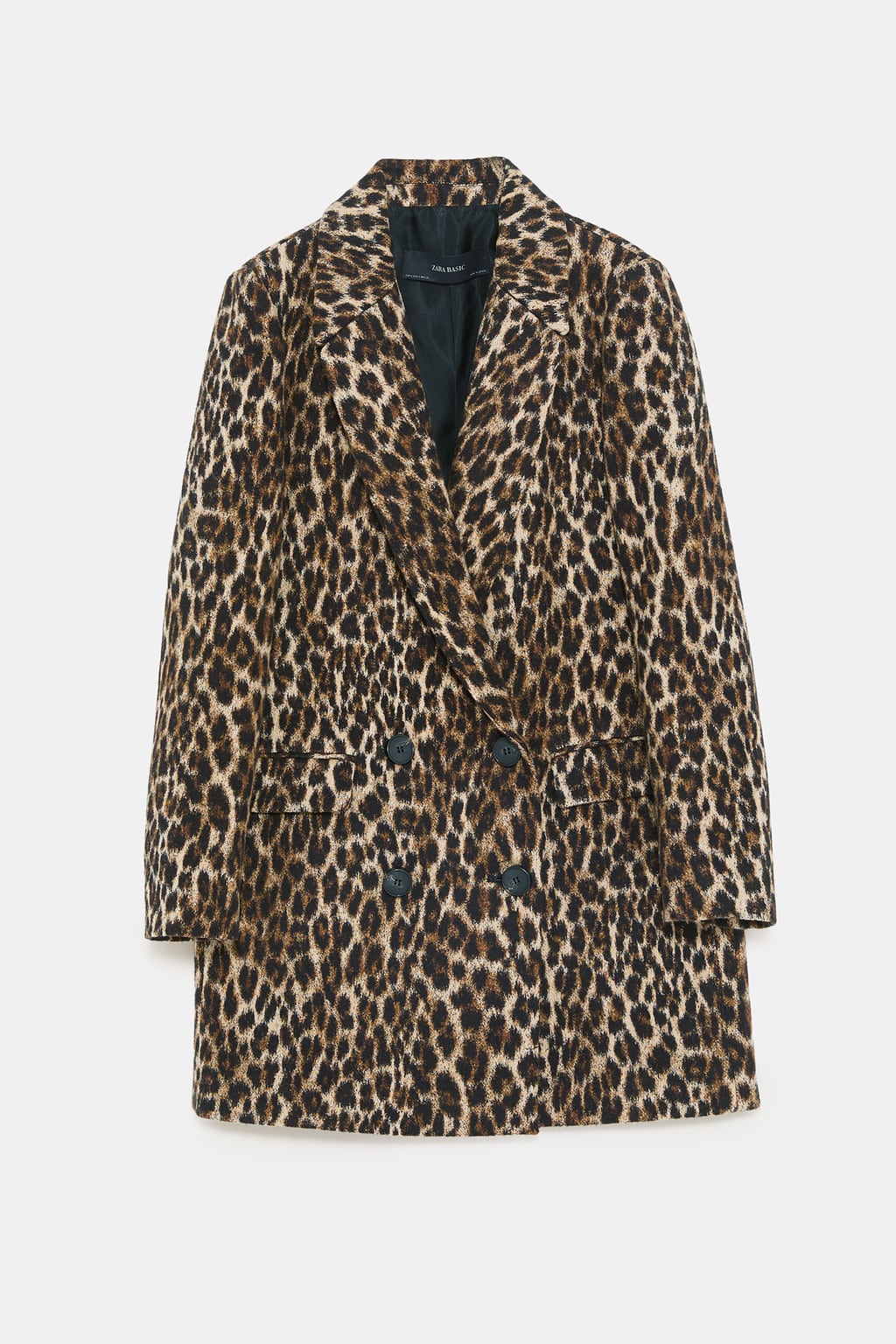 Abrigo de lana cruzado de Zara con estampado 'animal print'. (59,95 euros).