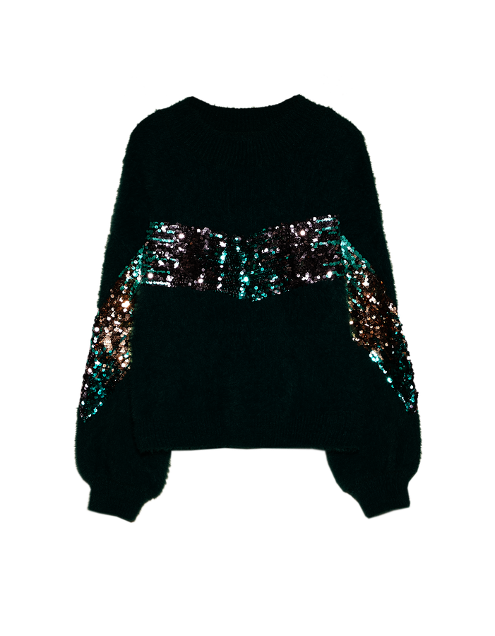 Este jersey con lentejuelas es de la colección de 'ugly sweaters' de Stradivarius (29.99 euros), pero  a nosotras no nos parece nada 'ugly' ...