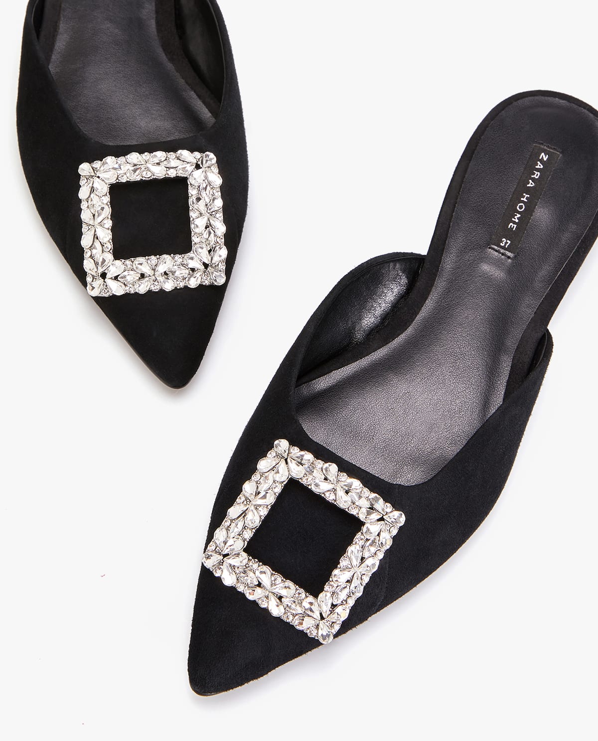 Mule con hebillas y brillos de Zara Home: 39,99 euros.