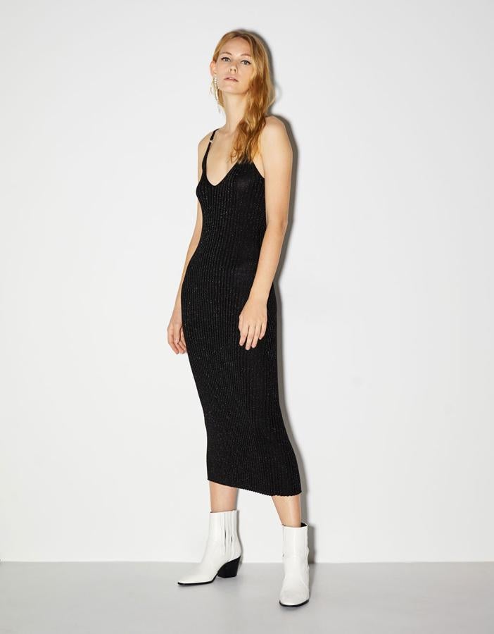 De punto con detalles de brillo y con largo mini (22,99 euros).