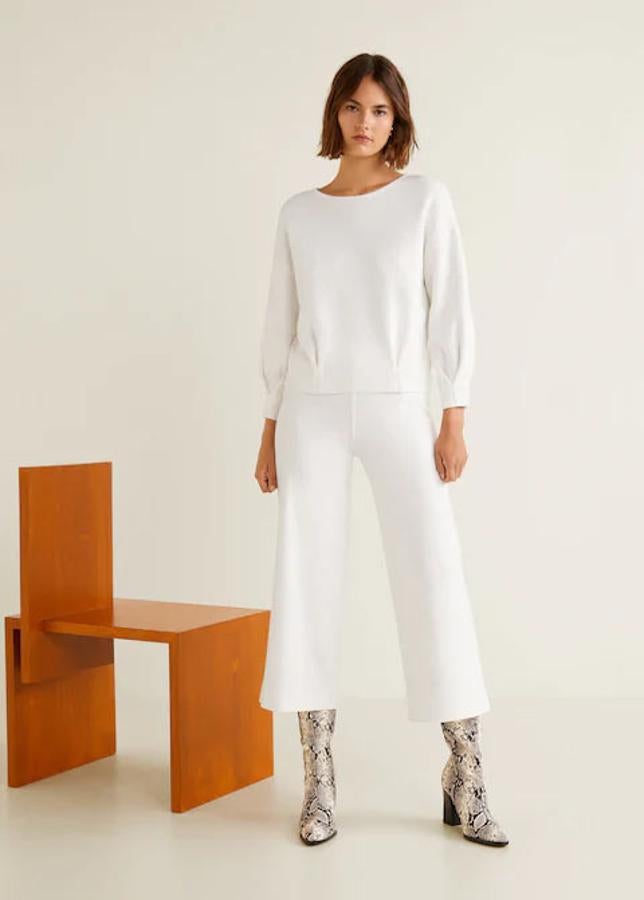 Pantalón crop de punto con cintura elástica, 19,99 euros.