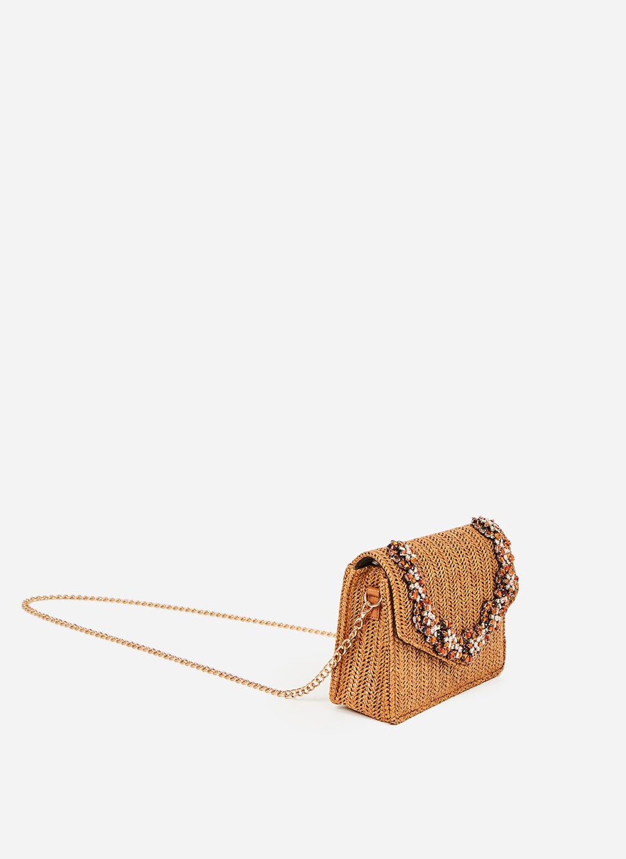 Bolso de rabia con solapa joya de Uterqüe: 59,95 euros.