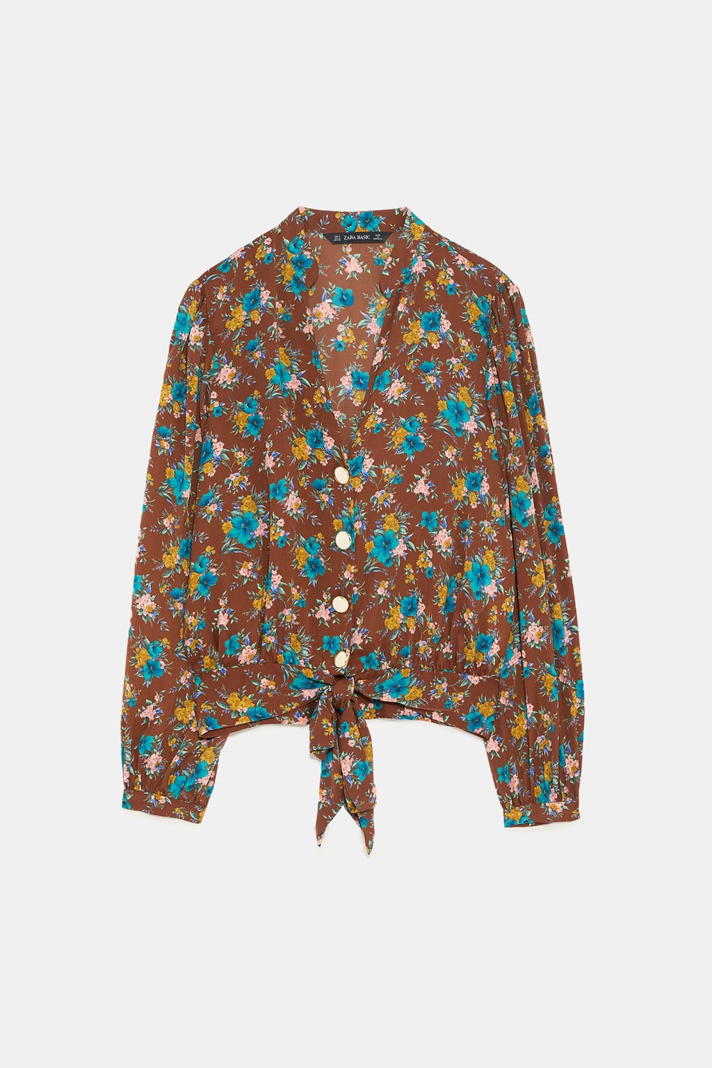 Cuerpo con estampado floral y botones de Zara: 9,99 euros.