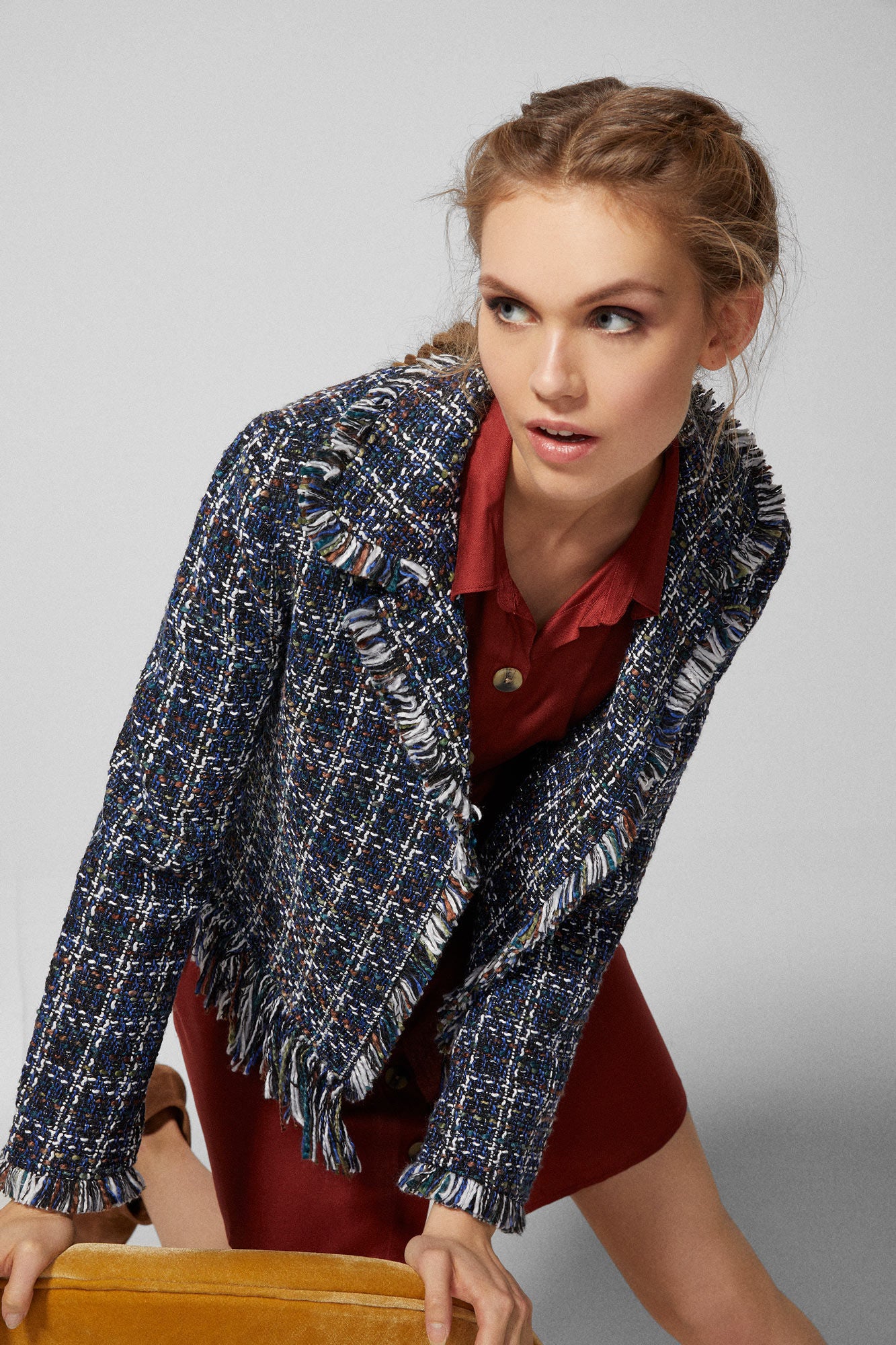 Chaqueta efecto tweed con flecos: 45,99 euros en Springfield.