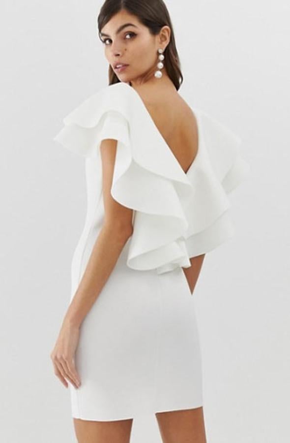 Minivestido con espalda abierta y  detalle de volante doble , 57,99 euros.