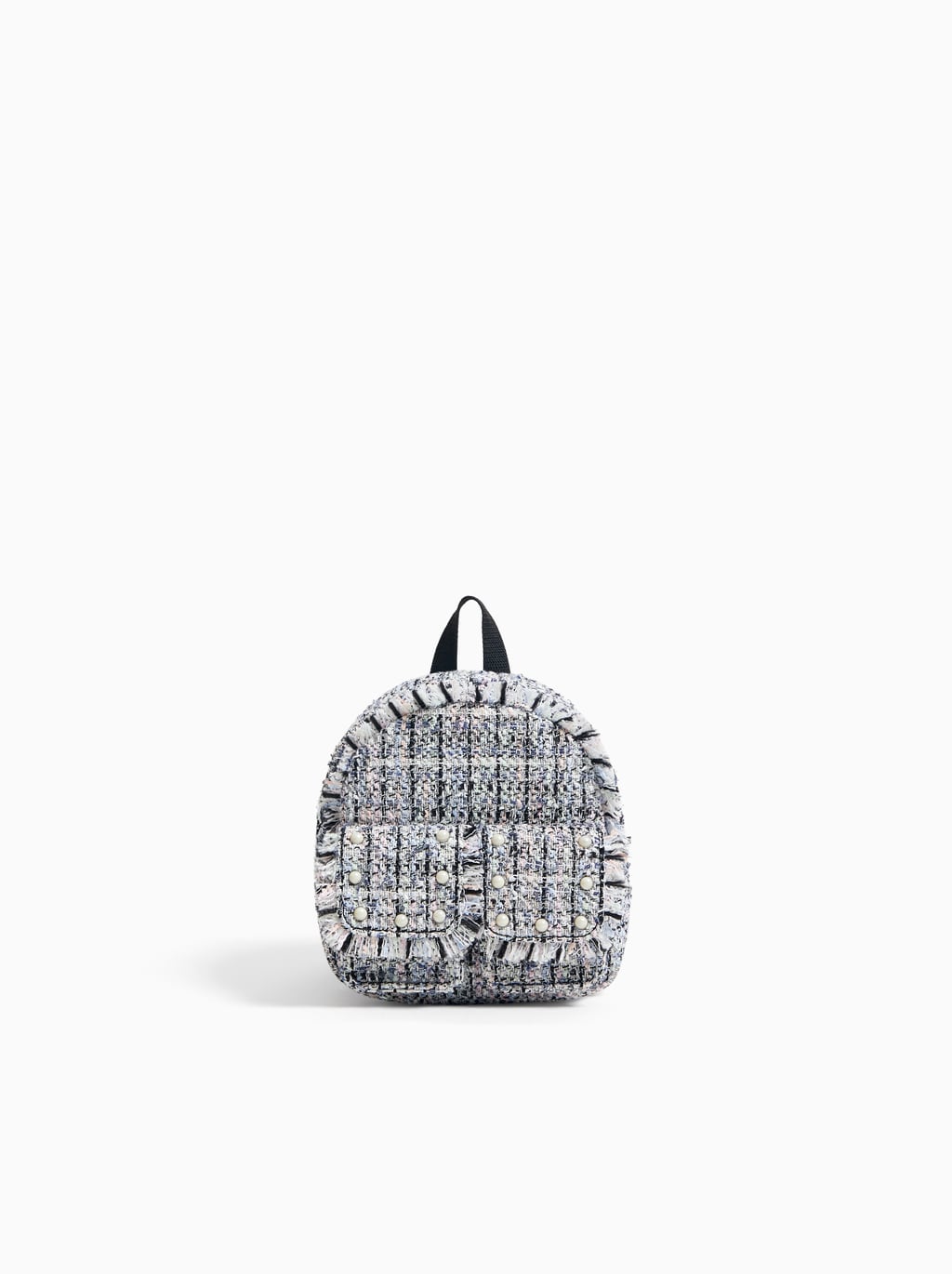 Minimochila de tejido tweed con dos bolsillos delante: 19,95 euros en Zara Kids. Alto x Ancho x Fondo 16 x 12 x 8,5 cm.