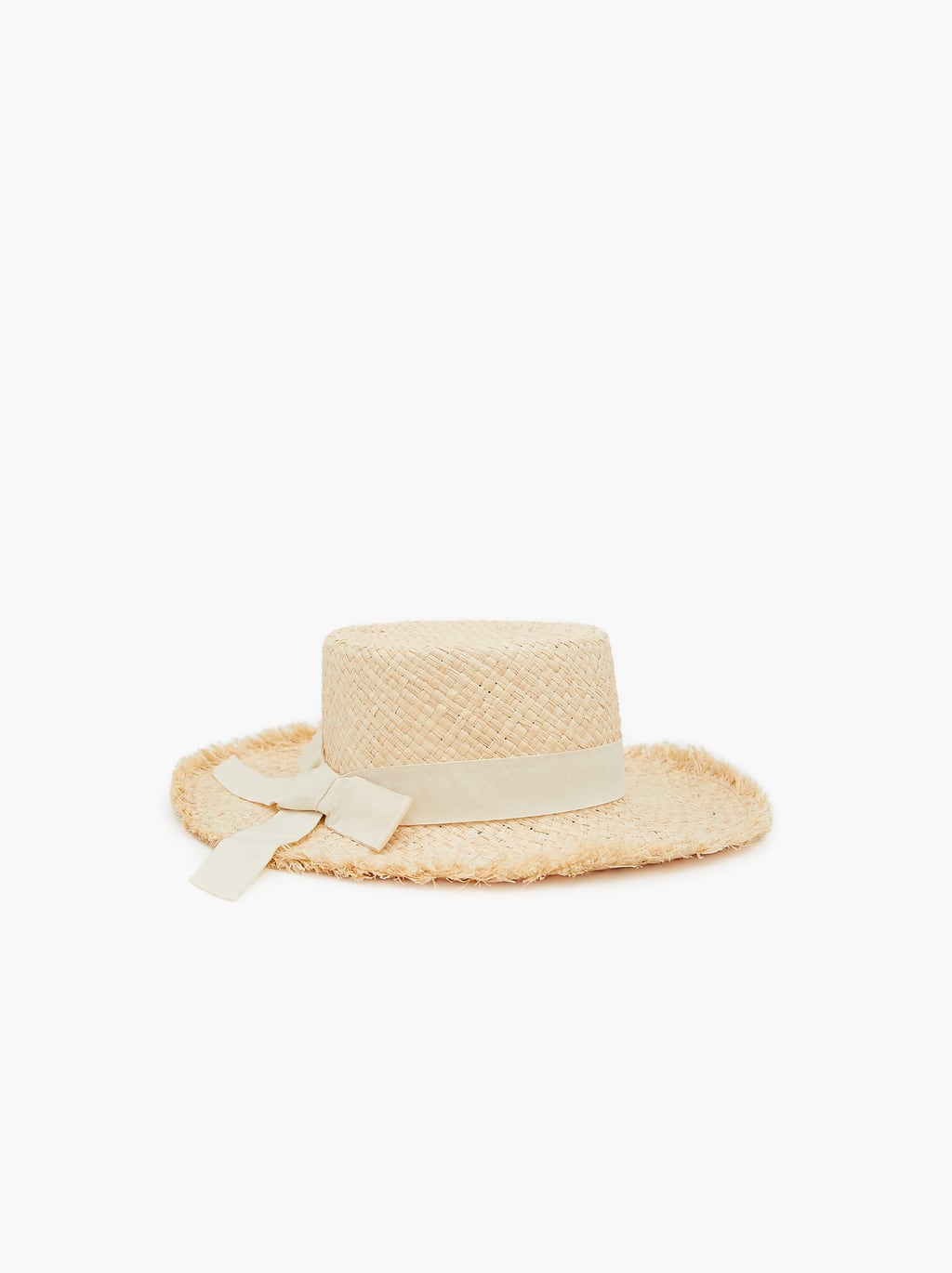 Sombrero de paja con cinta y lazo: 10,95 euros en Zara Kids. Disponible en talla S, M y L.