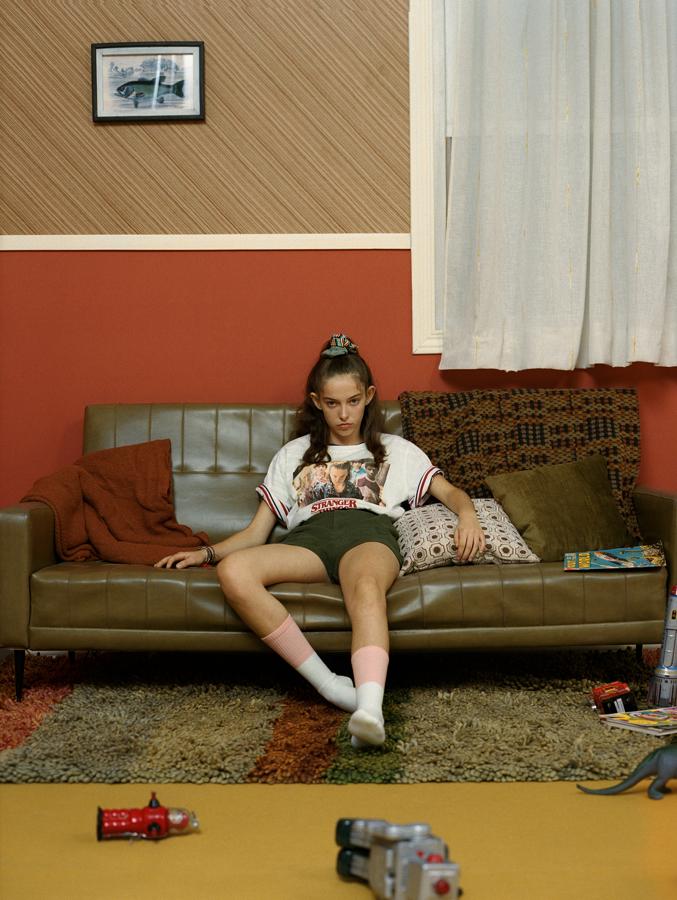 Camiseta de 'Stranger Things' blanca con foto de los personajes en el centro  (15,99 euros en Pull&Bear ).