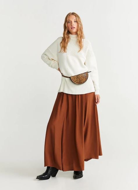 Sudadera blanca de punto combinado. (29,99 euros).