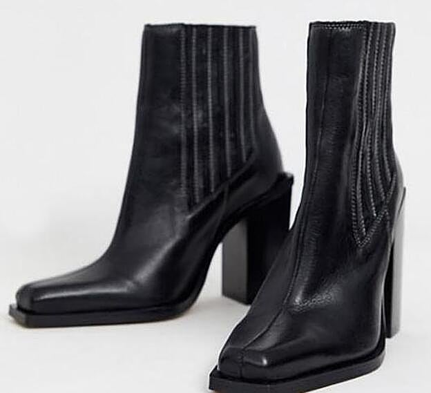 Botines Chelsea estilo western de cuero en negro East Coast de ASOS, 109,99 EUR.