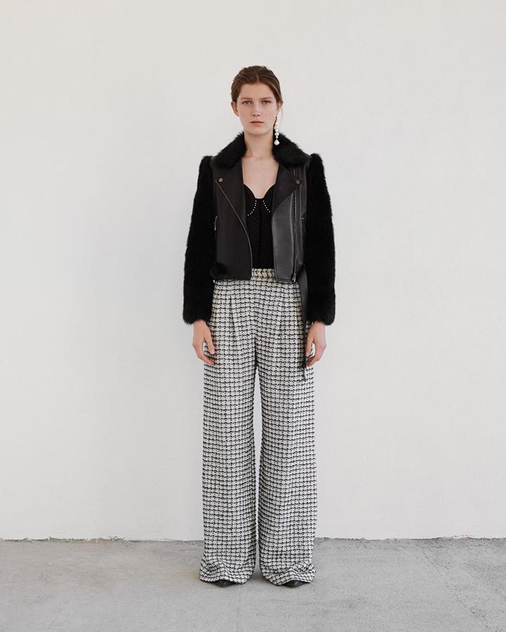 Este pantalón de tweed palazzo de Uterqüe cuesta 99 euros.
