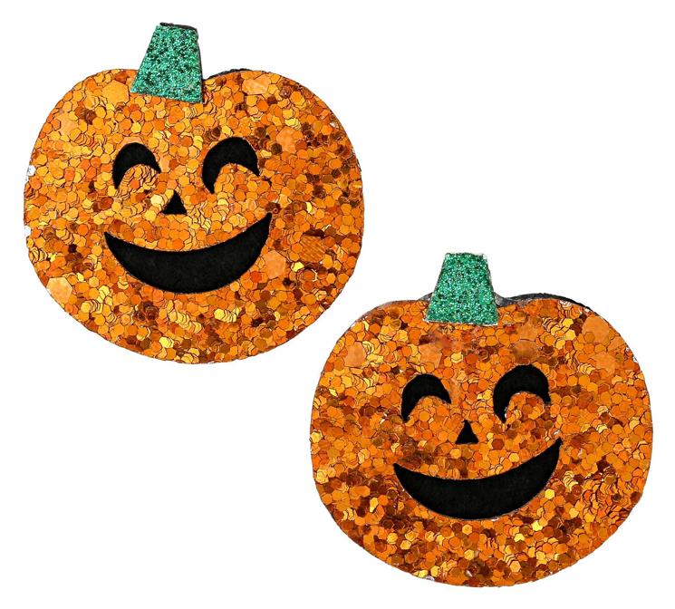 Los adornos para el pelo son excelentes aliados a la hora de meternos en el ambiente festivo. Estos pasadores de calabazas con brillos en naranja y verde son un complemento ideal por 3,95 euros.