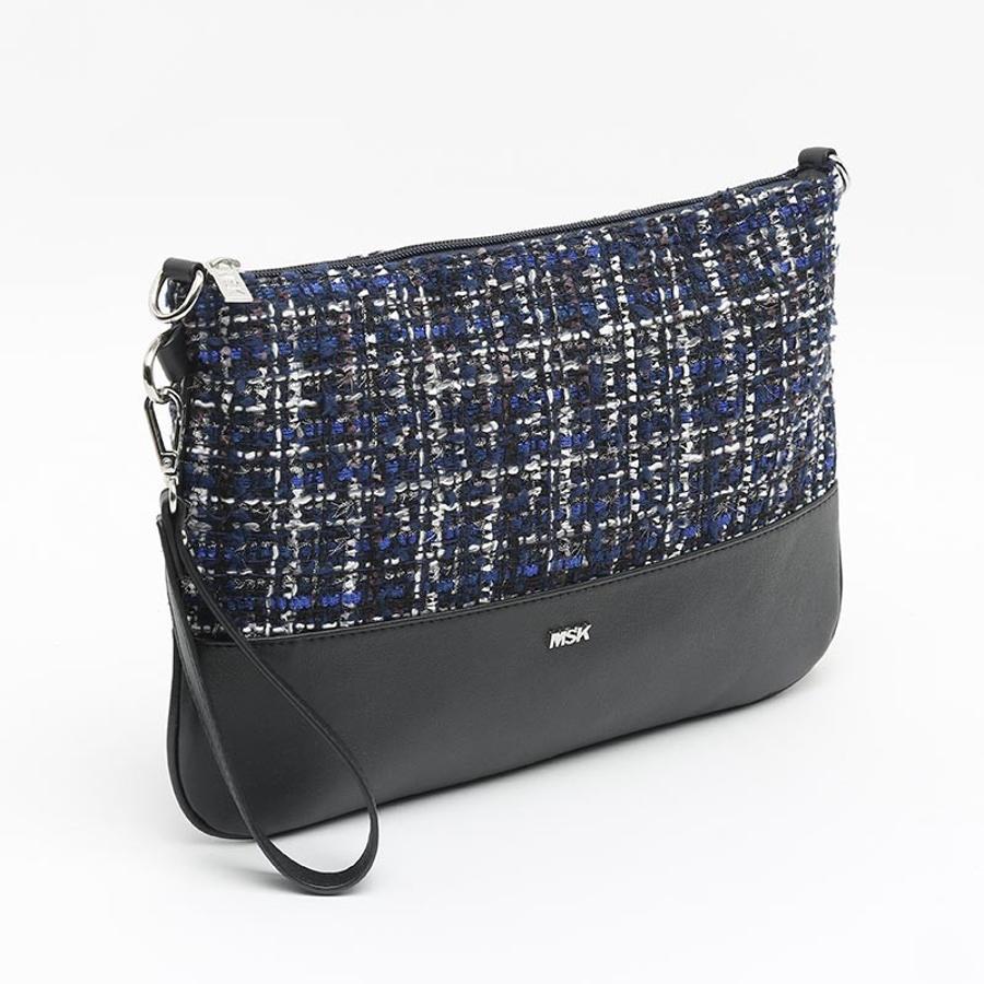 Entre las nuevas propuestas de Misako encontramos algunas de las tendencias de este otoño, como los cuadros o el tweed. A nosotras nos ha gustado más con sus toques en azul, pero también está disponible en gris y negro. Cuesta 16,99 euros.