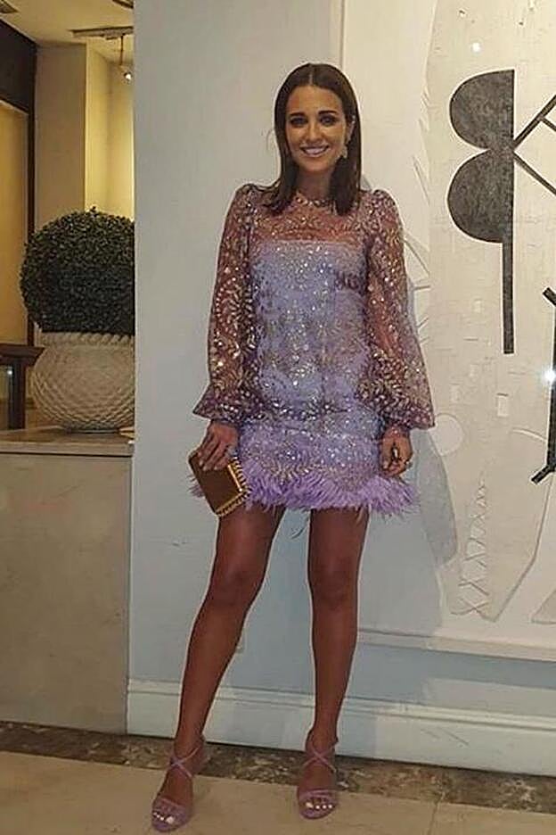 Paula Echevarría repetía look de plumas para una fiesta con un vestido de la firma española Fraile.