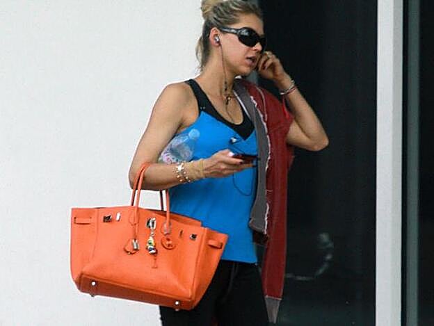 Anna Kournikova con su Birkin naranja