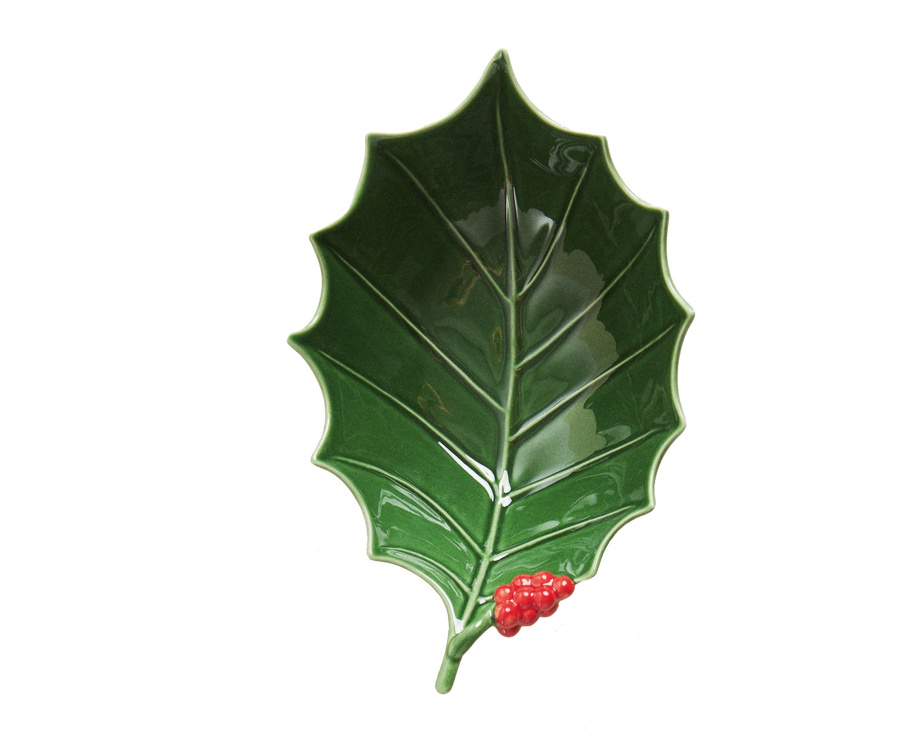 Un simple guiño puede convertir tu mesa en una postal navideña. Prueba, por ejemplo, con este bol en forma de acebo.