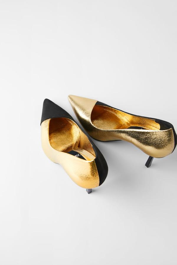 Si buscas unos zapatos en dorado, este es tu par. Y si no los buscas probablemente también. Porque es difícil encontrar unos zapatos de fiesta más ideales que estos en acabado bicolor asimétrico. Negro y dorado compiten para crear (en realidad) dos zapatos diferentes, y están disponibles entre los números 35 y 42. El tacón mide 8,5 centímetros y cuestan 35,95 euros.