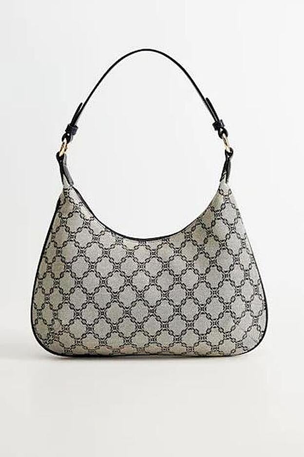 Bolso baguette con estampado jacquard. (25,99 euros).
