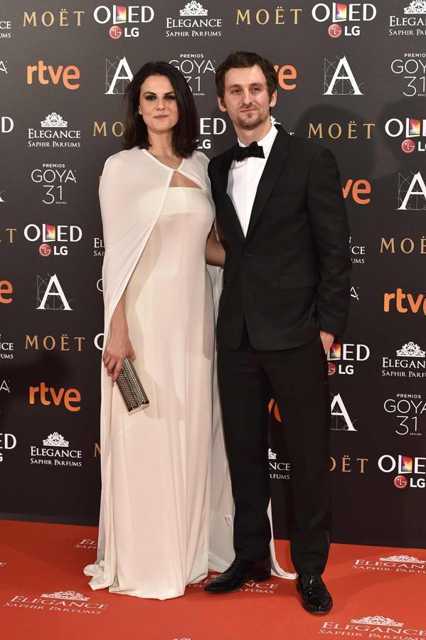 Raúl Arévalo, de Dior, junto a su chica, la actriz Melina Matthews.