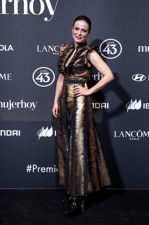 Aitana Sánchez Gijón. La actriz, que llevaba un vestido de Teresa Helbig, además de acudir como invitada, presentó la entrega de los Premios Mujerhoy.