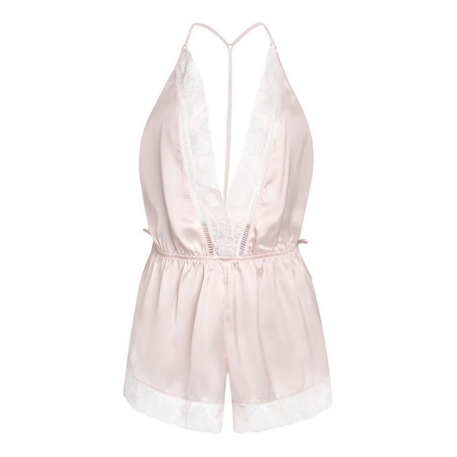 Mono rosa de encaje y satén con la espalda al aire, de Primark, (14 euros).