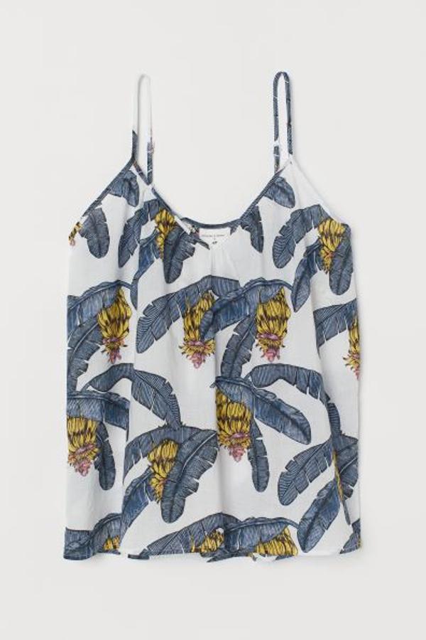 Top de tirantes con estampado de hojas de palmera, que ya se ha agotado en todas las tallas, de Desmond & Dempsey para H&M (9,99 euros).