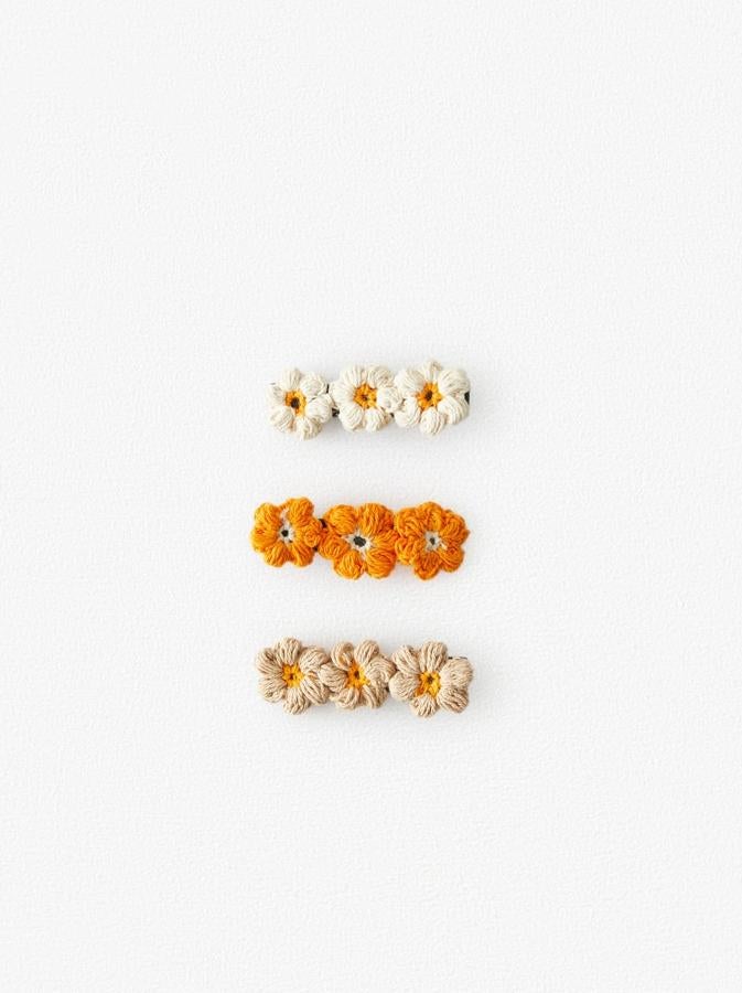 Horquillas de flores hechas en crochet, de la colección de verano de Zara Kids (6,95 euros el pack de tres).