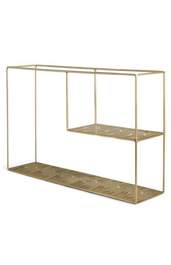 Esta estantería dorada con estampado de hojas troqueladas cuesta 8 euros.