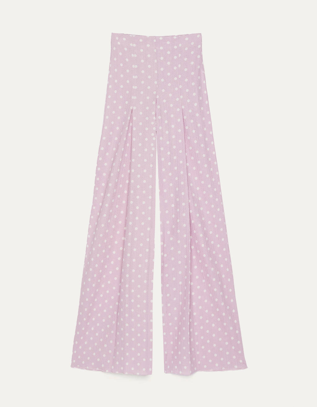 Pantalones wide leg con estampado de lunares en tono lila. (19,99 euros).