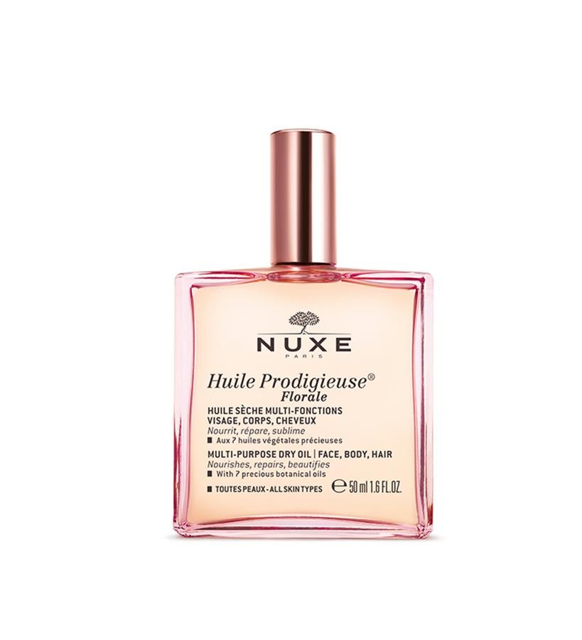 Contiene un cóctel de siete aceites 100 % vegetales que nutren, reparan y subliman en un solo gesto rostro, cuerpo y cabello. Pomelo, acorde floral de flor de azahar y magnolia y fondo aterciopelado de almizcles blancos son las notas que protagonizan su aroma.  Huile Prodigieuse Florale de Nuxe  (19,90 €).