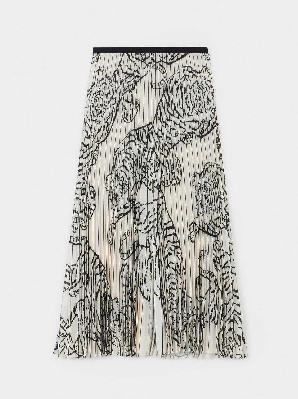 Falda midi plisada en color blanco con estampado animal para llevar de la mañana a la noche. (39,99 euros).