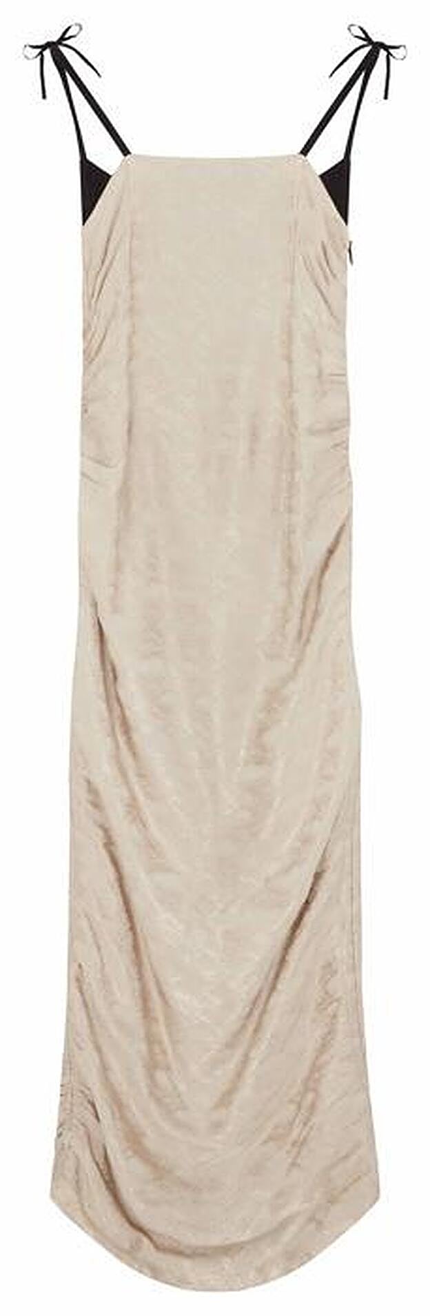 Vestido reversible en tejido reciclado, de Asos (53,99 €).