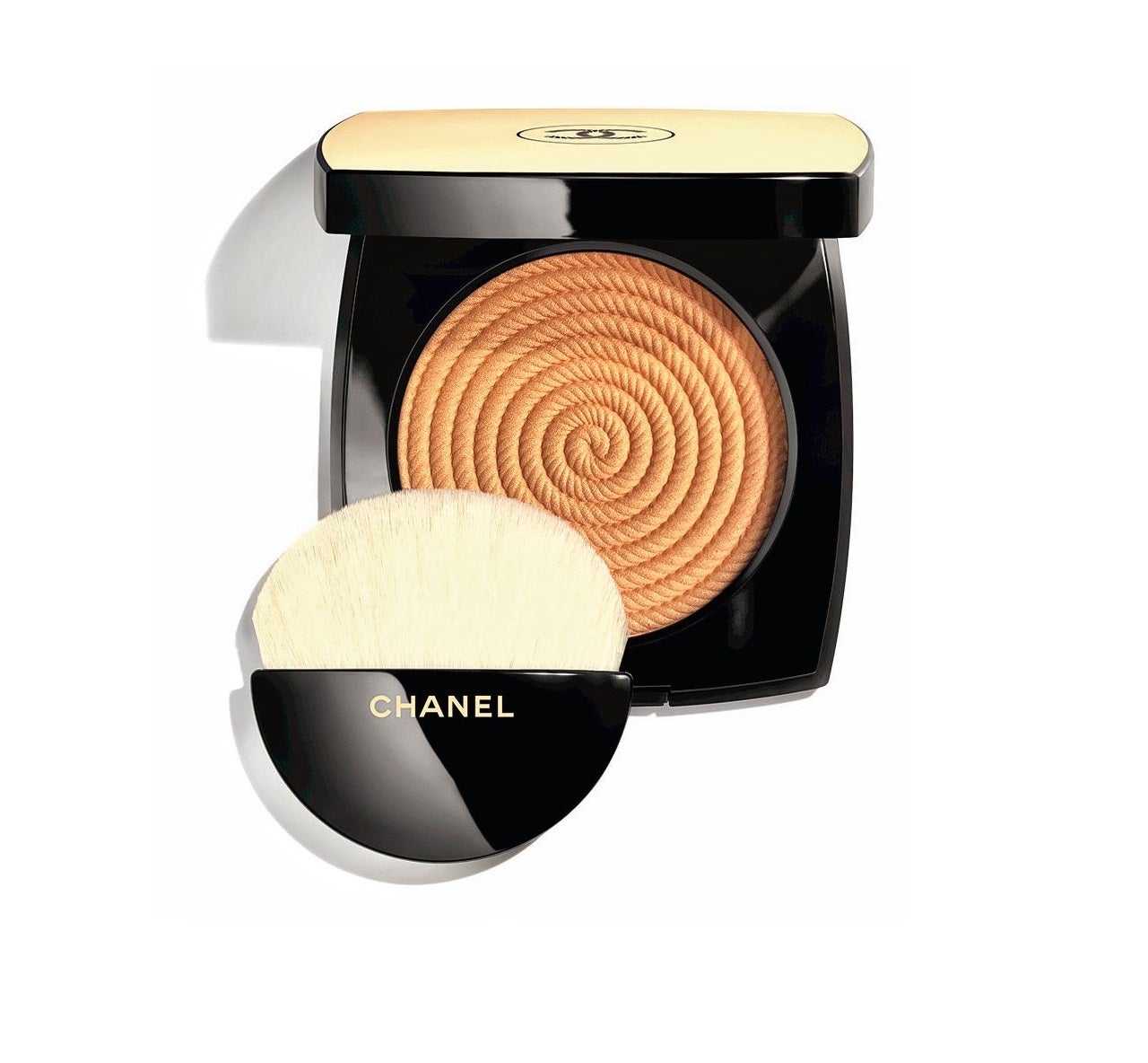CHANEL. Healthy Glow Illuminating Powder (50,95 €).