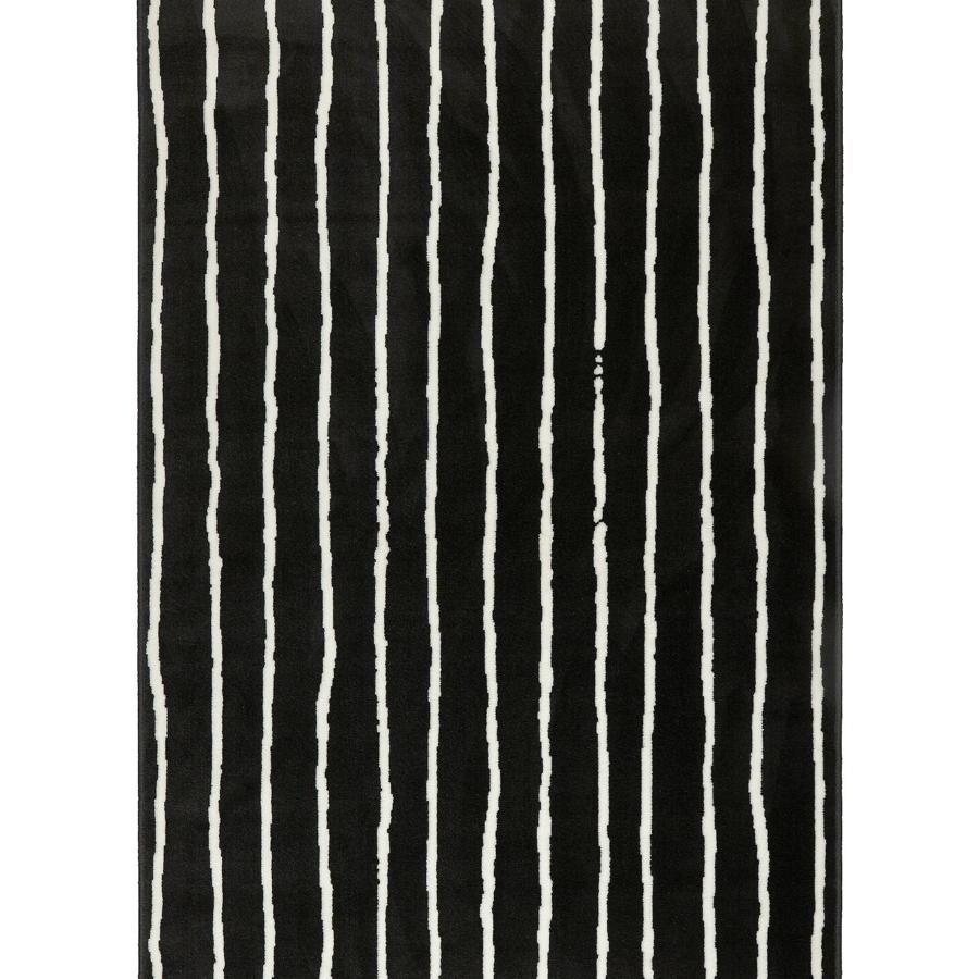 Con medidas de 133x195 centímetros, esta alfombra de pelo corto con rayas en blanco y negro tiene un precio de 25 euros.