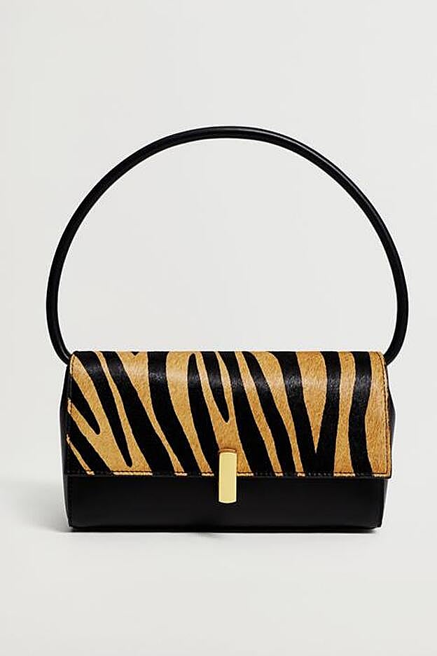 Con diseño baguette, este bolso será el protagonista absoluto de tus looks.