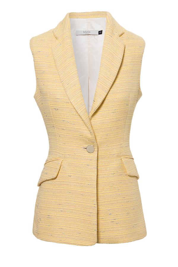 Chaleco amarillo de tweed, de Bleis Madrid (131 euros).