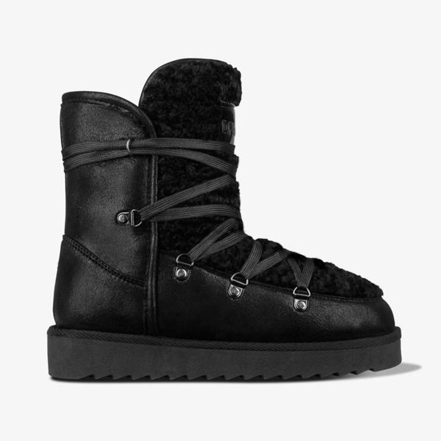 Botas negras para la nieve con suela dentada, de Dr. Franklin (54 euros).