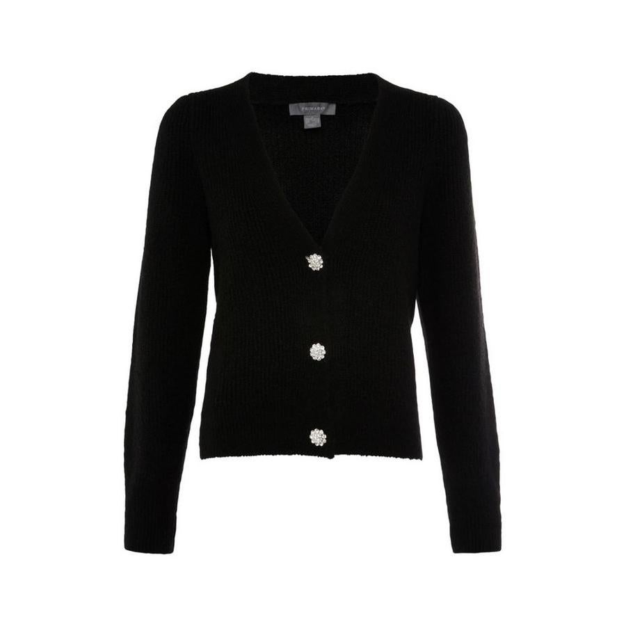 Chaqueta de punto en color negro con bortones joya (19 euros).