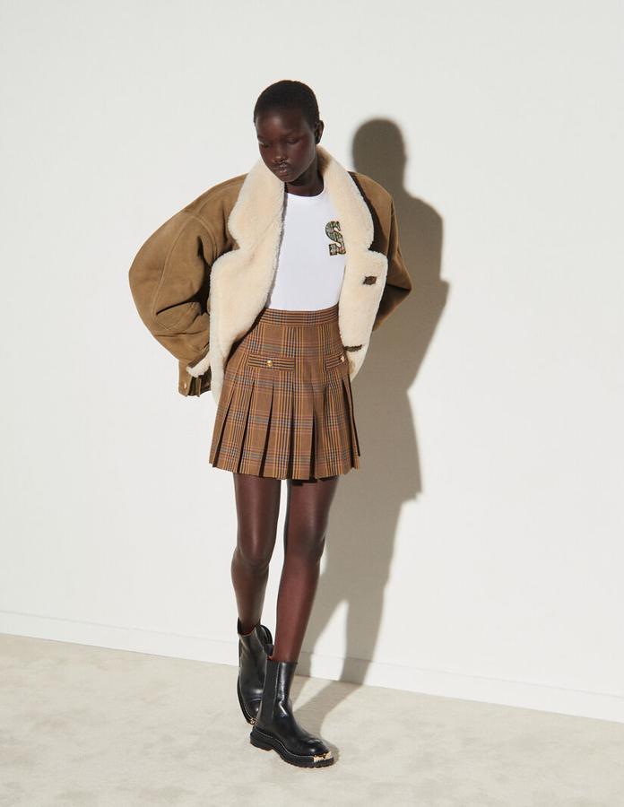 Falda plisada de cuadros, de Sandro Paris. Rebajada de 195 a 136,50 euros.