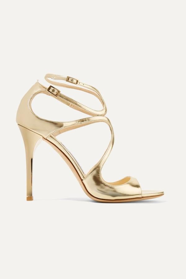 Sandalias de tacón con acabado metalizado,de Jimmy Choo, por 487 € (antes costaban 695 €).